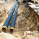 Industrial Pipe Being Installed Underground With View Of Lining
