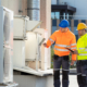 Two Men Inspecting Commercial Hvac Unit